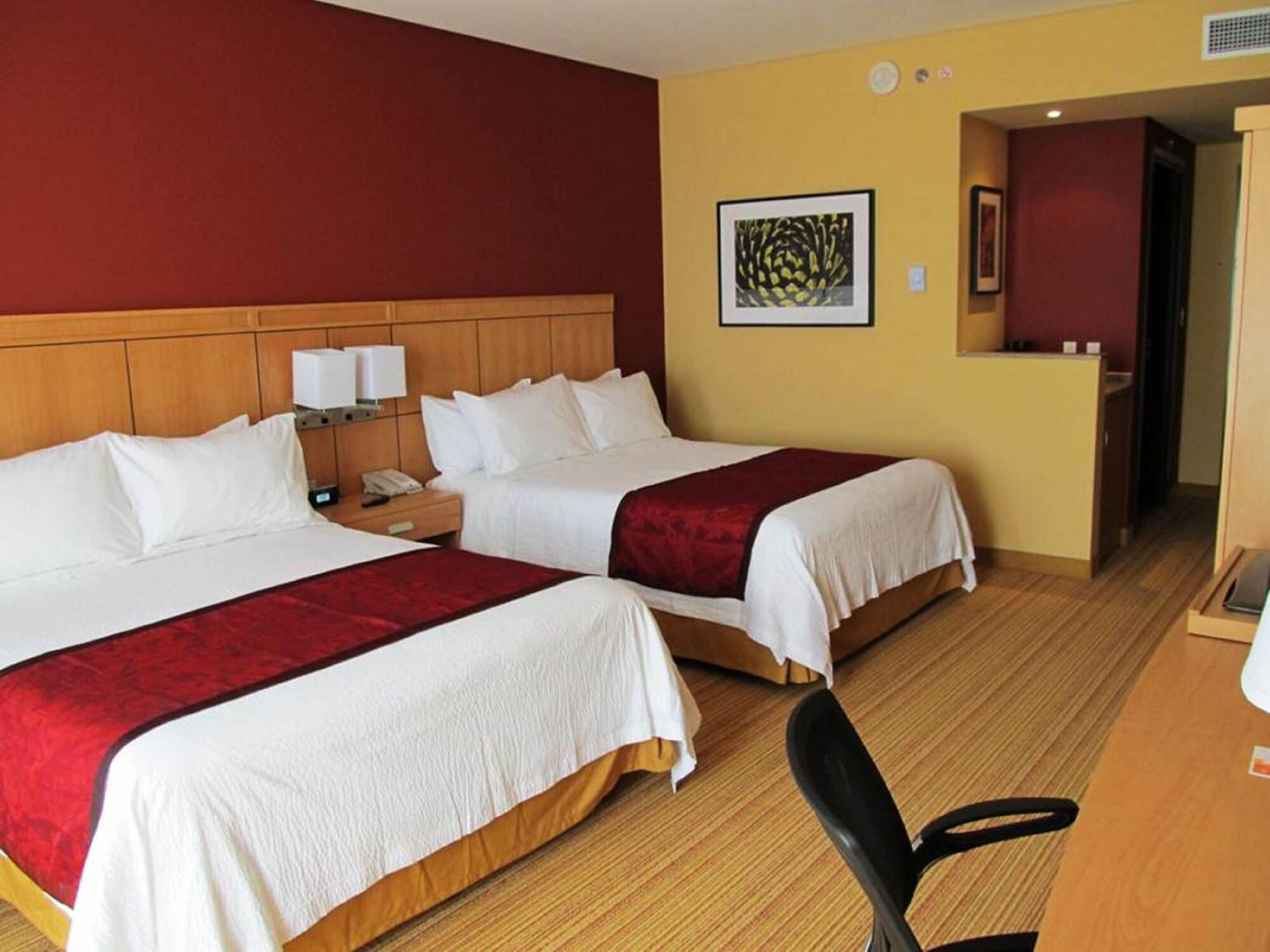 Courtyard By Marriott Leon At The Poliforum Bagian luar foto